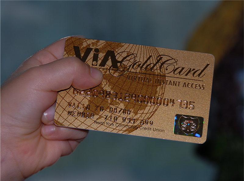 Adrian Kanngard holds the first ViA Gold Card in his hand